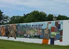 The Build Your Future mural on the side of the warehouse