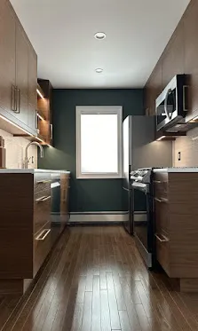 Galley kitchen, two-tone, slate-green accent.