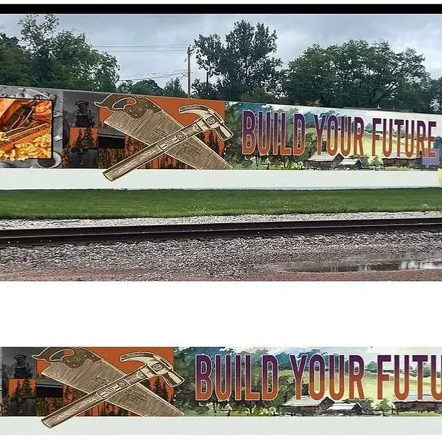 A detail from the Build Your Future mural on the south wall of the building, painted by fifty Wausau volunteers in June 2023.