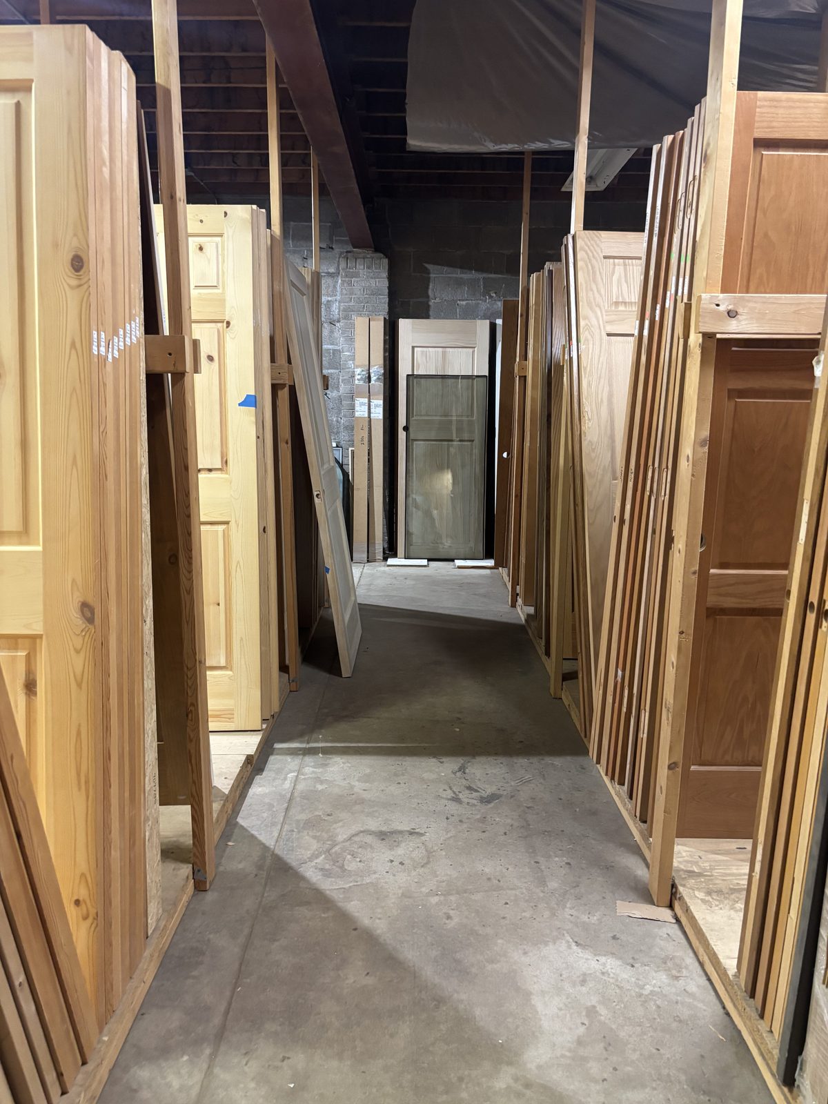 Doors on the Price-Less warehouse floor