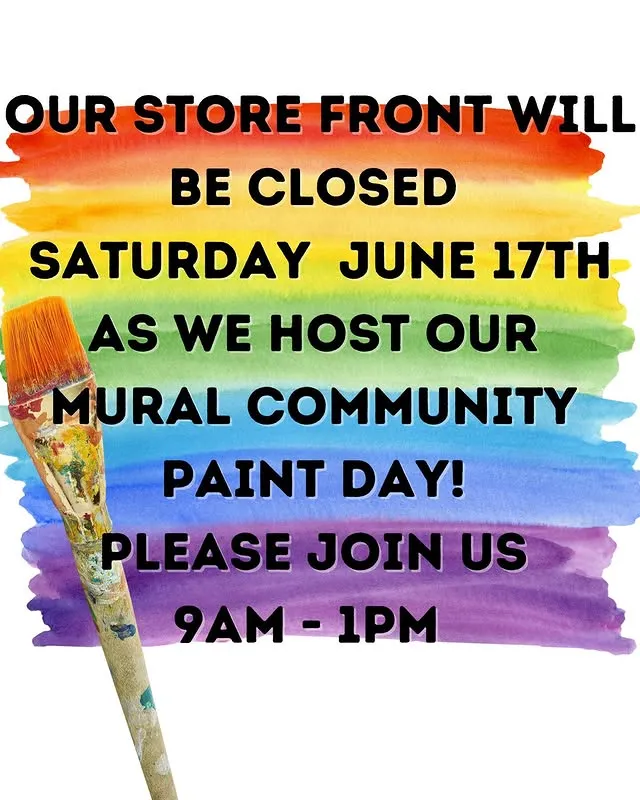 Volunteers at the Price-Less Paint Day mural event.